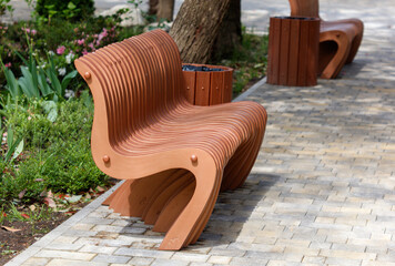 A bench with a tree trunk in the middle of it