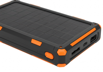 A rugged black and orange solar power bank with usb ports for portable charging isolated on transparent background