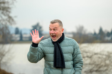 Surprised Man Waving Hello Playfully