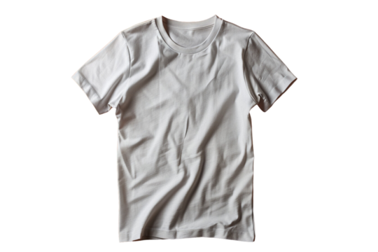A simple, crumpled white short-sleeved t-shirt lies flat against a dark background.  Its texture and wrinkles are clearly visible