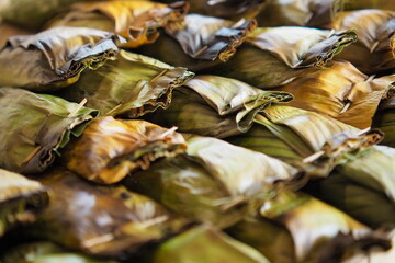 Traditional Delicacies: Steamed Treats Wrapped in Banana Leaves