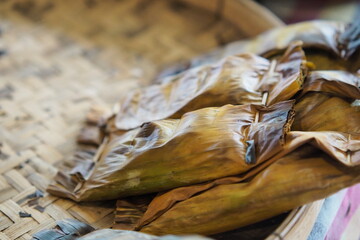 Authentic Asian Cuisine: Fragrant Parcels on a Woven Tray