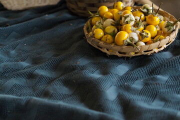 Golden Nightshades in Basket: A Rustic Harvest Display.