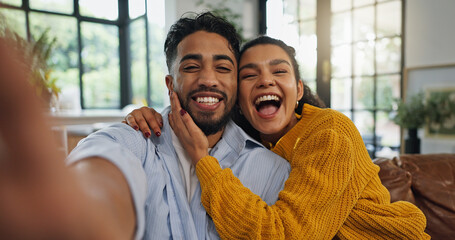Home, selfie and couple on sofa, funny and bonding together with happiness, love and smile in...