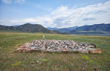Ancient burials in the Altai mountains on terrace of the Katun and Bolshoy Yaloman rivers.