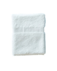 Soft white towel neatly folded on a plain surface