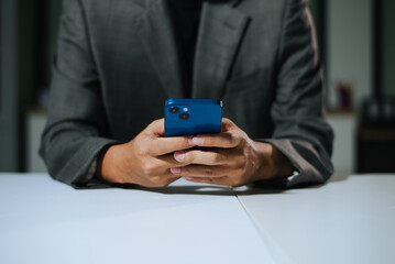 Business man sitting front tablet ,laptop computer with financial graphs and statistics