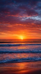Fototapeta premium Beautiful golden sunset paints the sky and clouds over the ocean's horizon, with warm orange and red reflection dancing on the sea water near the beach golden sunset paints the sky and clouds