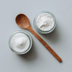Two jars of flour with a wooden spoon