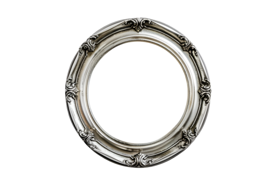 Ornate silver oval picture frame on black background