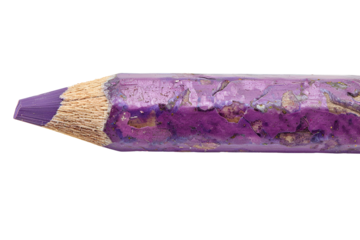 Closeup of a well used purple pencil showing wood and paint