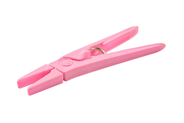Pink plastic clothespin isolated on black background