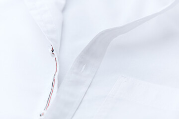 Close up of white Men's shirt.	