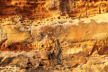 Shapes and textures of the rocky material of a cliff at Galizano Beach, Cantabria, Spain.