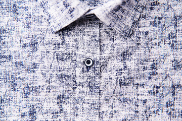 Close up of men's linen shirt. Soft focus.	