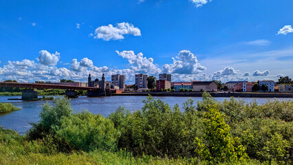 Fototapeta premium View of the city of Sovetsk in the Kaliningrad region of Russia from Lithuania, the European Union. The banks of the Neman River.