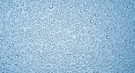 Blue sky with many small and large water droplets on glass rain condensation