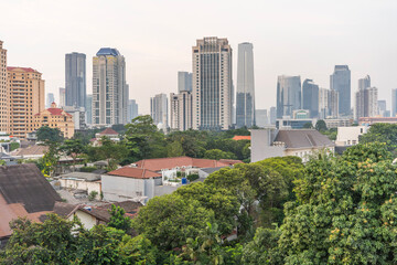 A view of a metropolitan city with a backdrop of modern skyscrapers and residential areas...