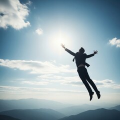 Businessman leaping towards bright sun in blue sky over mountains suit jumping