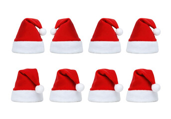 A collection of eight red santa hats with white fur trim and white pompoms, isolated on a transparent background