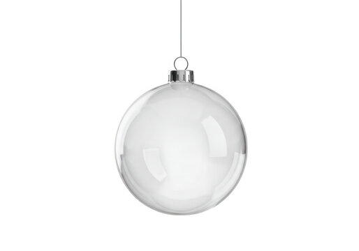 A clear glass christmas ornament hangs isolated on a transparent background, ready for customization