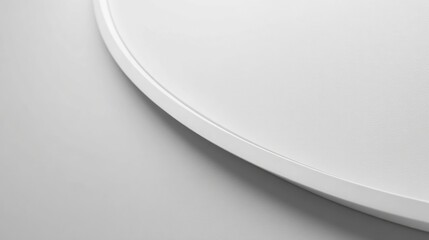 White, curved, geometric lighting fixture detail