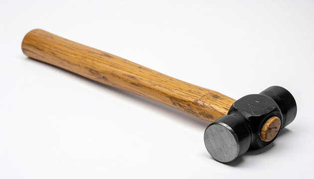 Ball peen hammer with wooden handle on white background. Working tool, equipment.