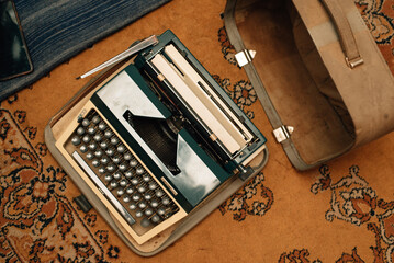 Antique typewriter on the carpet