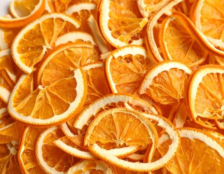 Fresh and juicy citrus fruit slices of dried orange and lemon isolated on a white background