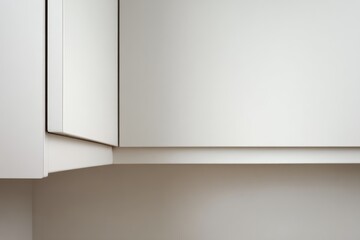 Close-up of a modern white kitchen corner cabinet