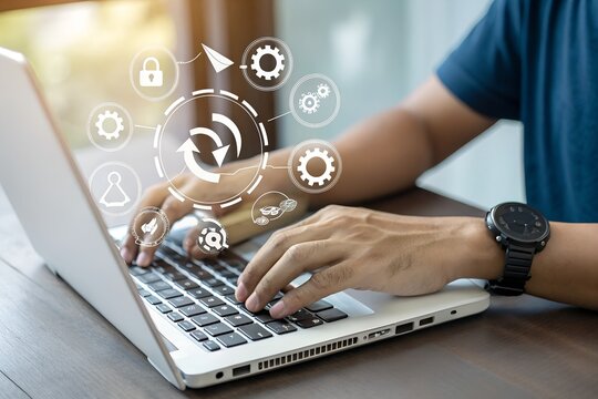 Software update or operating system upgrade concept. Improved functionality in the new version and improved security. Person using laptop with Software update and upgrade technology.