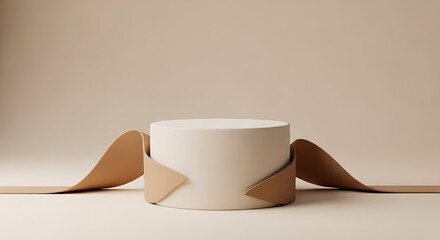 Beige cylindrical podium with flowing ribbons, minimalist product display.