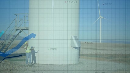 Engineer ending call at wind turbine base while scanning tower and monitoring realtime data overlay - Powered by Adobe