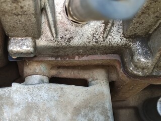 Antifreeze is leaking from under the cylinder head of the car engine