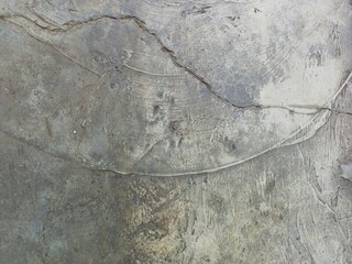 Distressed Cement Floor Surface with Visible Cracks
