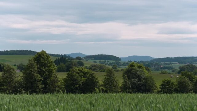 View of a czech hill Velky Blanik in distance on horizon with idyllic landscape in the front