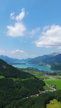 Austria's alpine charm Strobl on Lake Wolfgangsee, drone view