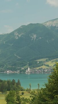 Summer splendor Lake Wolfgangsee, Strobl, and Salzburg Alps, vertical drone