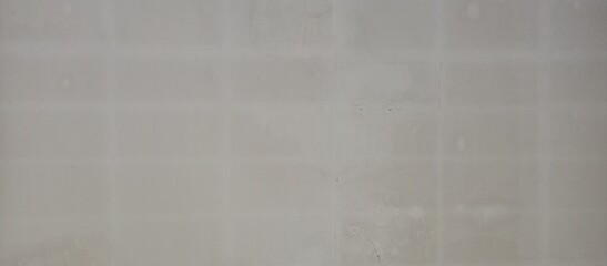Fototapeta premium Subtle Grid Pattern on Light Gray Surface Texture