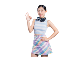 A cheerful young Asian woman with headphones, making an OK hand gesture to signify perfection, approval, or that everything is great and posing on png
