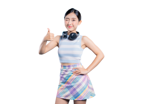 A playful young Asian woman with headphones, winking and giving a thumbs-up for approval, success, or a great choice and posing on png
