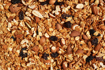 Pile of Granola with Almonds, Walnuts, Seeds. Traditional Food for Breakfast.