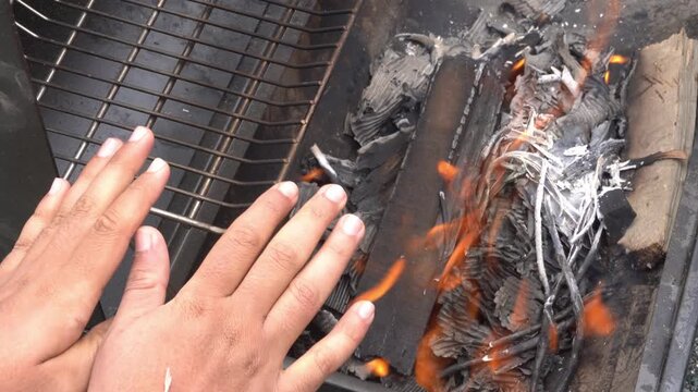 Lighting Campfire with Wood and Charcoal for Outdoor Cooking