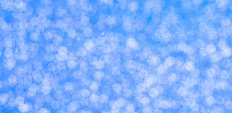Abstract magic blue bokeh with soft light circles. Long banner, copy space