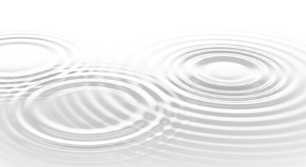 Abstract image of concentric ripples spreading across a white surface.