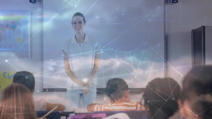 Teacher delivering lesson, pulsing network overlay emerging around whiteboard for digital learning - Powered by Adobe