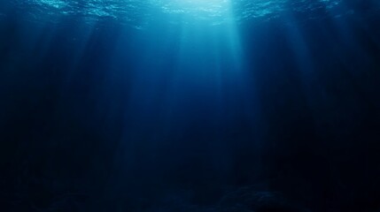 Fototapeta premium Sunlight Rays Shining Through Deep Blue Ocean Water Background Image
