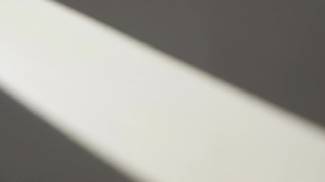 Diagonal Sunlight Ray Casting Shadow on Light Background Texture