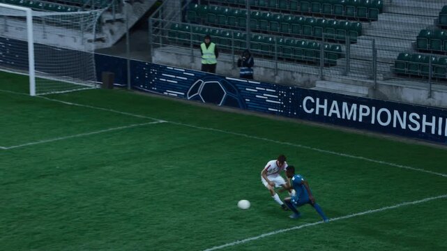 Black Soccer Player Running with the Ball, Attacking the Gate but Goalkeeper Catching the Ball. International Football Night Championship. Sport Broadcast Channel Television Playback