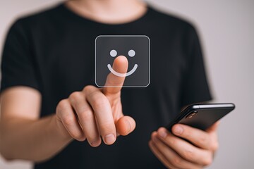 Close-up of person holding smartphone with smiling face emoji on screen showing happiness and connection.